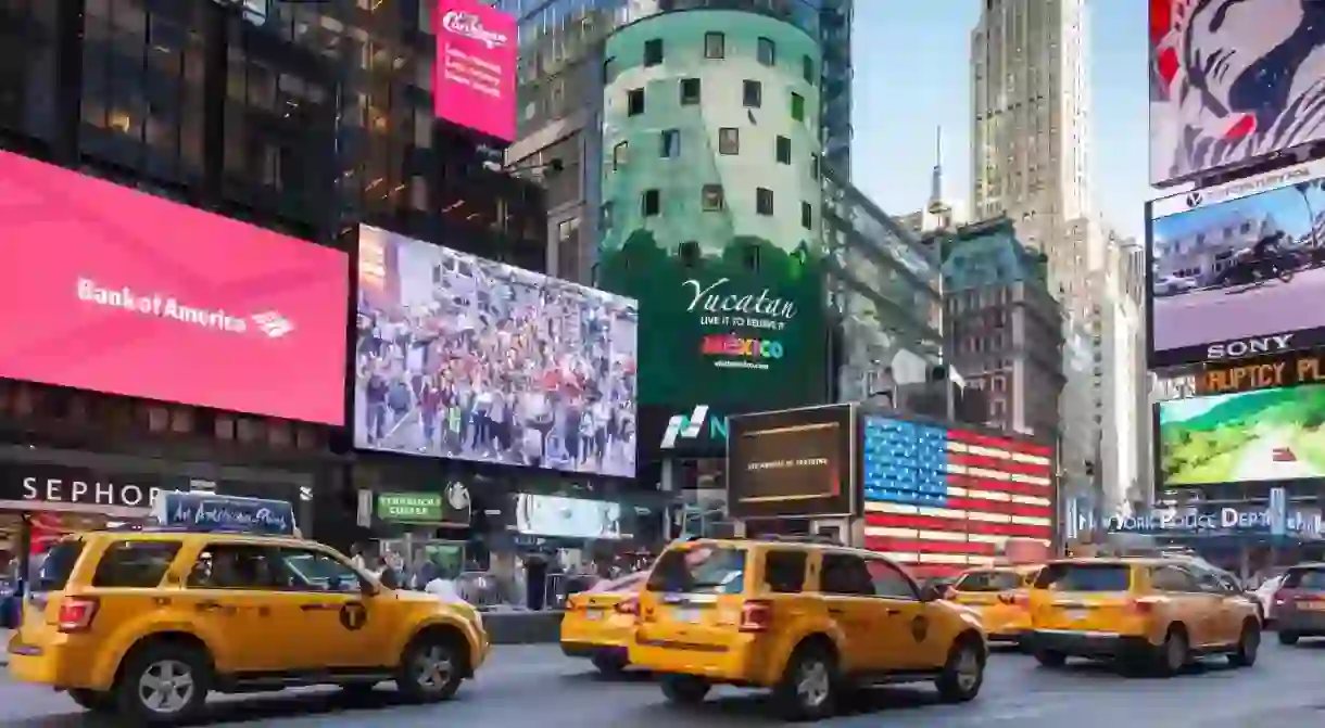 Experience Times Square humming with life at the heart of Midtown Manhattan