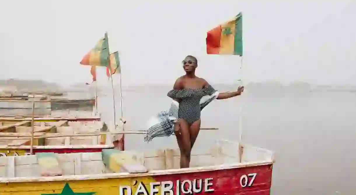 Nabongo during her two-and-a-half-year world trip, seen here on the Lac Rose in Senegal