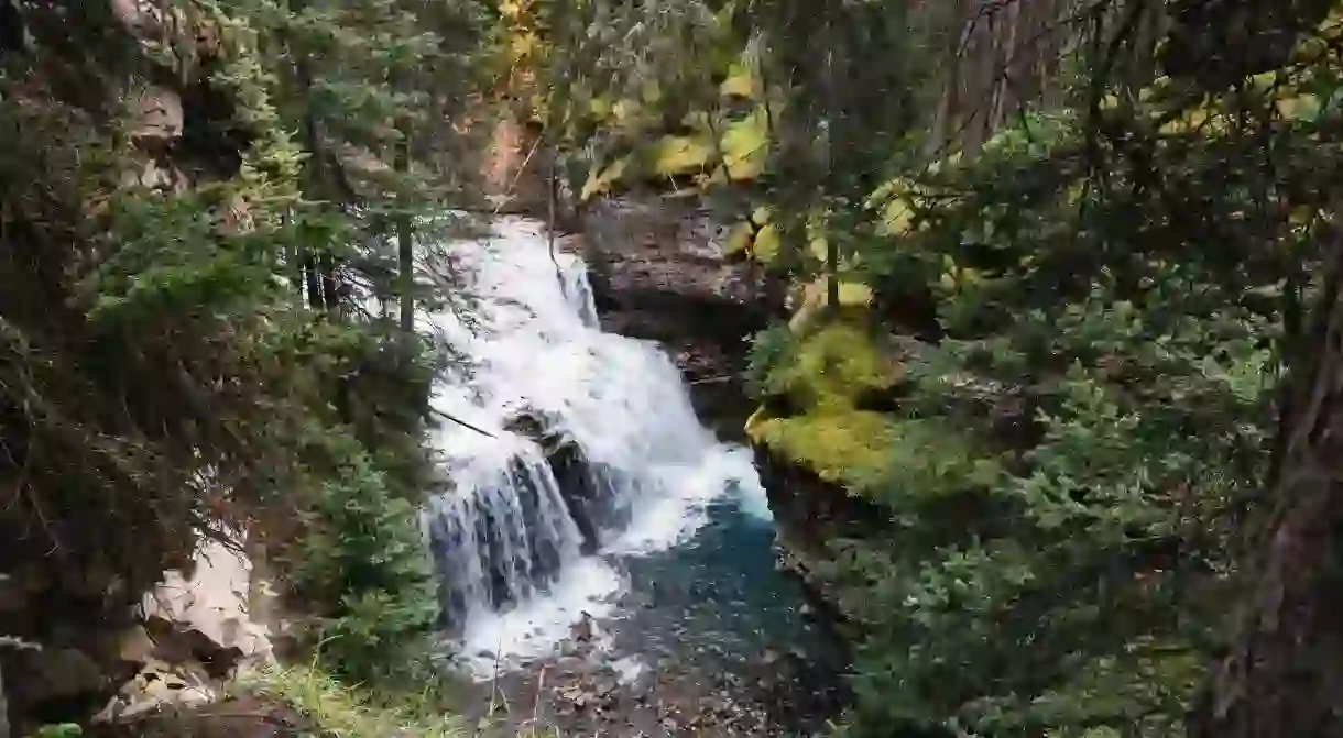 Even on rainy days, a walk through Johnston Canyon is scenic and enjoyable