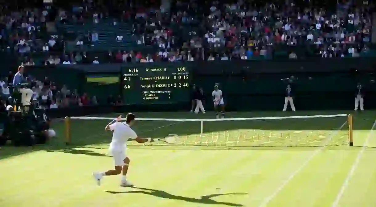 Novak Djokovic demolishes Jérémy Chardy on Centre Court in 2011, winning in straight sets