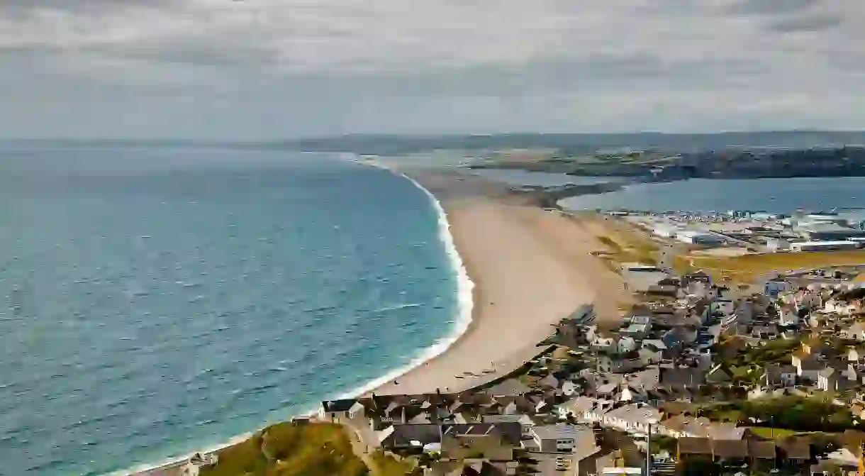 Take a trip to one of the many British beaches, such as Chesil beach in Dorset, that often get overlooked but are well worth a visit