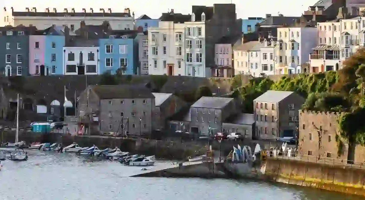 The colourful harbour in Tenby, Wales, makes for a scenic getaway