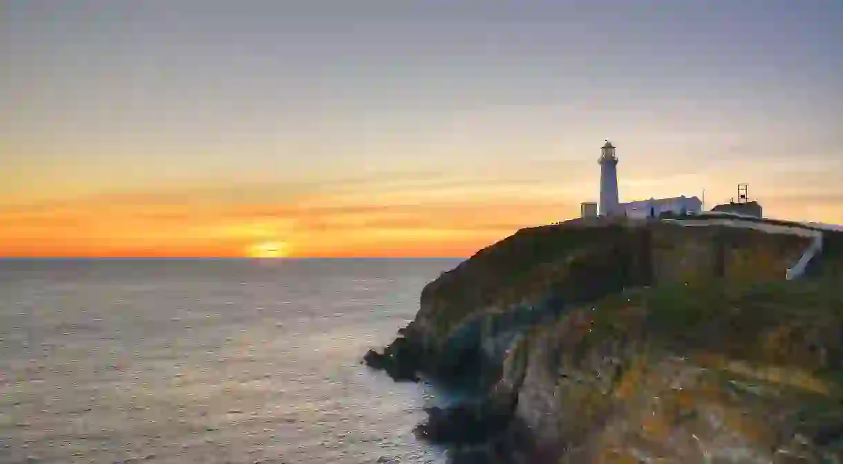 The South Stack lighthouse, off the coast of Anglesey, is a beautiful spot to watch the sun go down