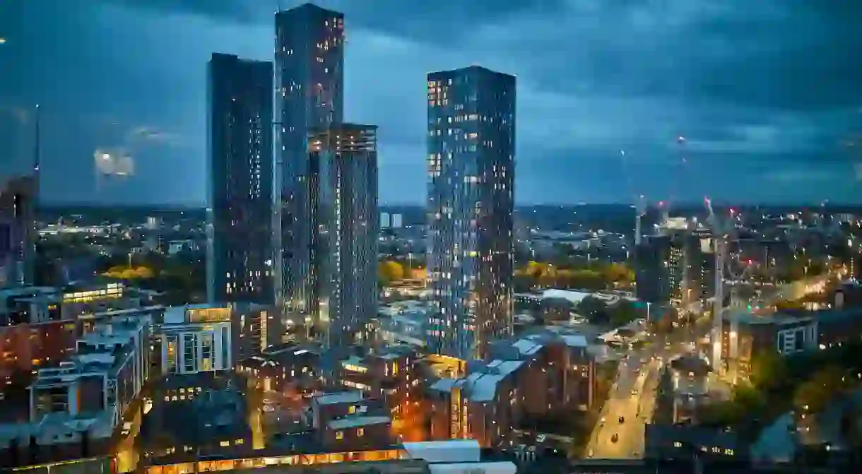 The striking Deansgate skyline in Manchester gleaming at night