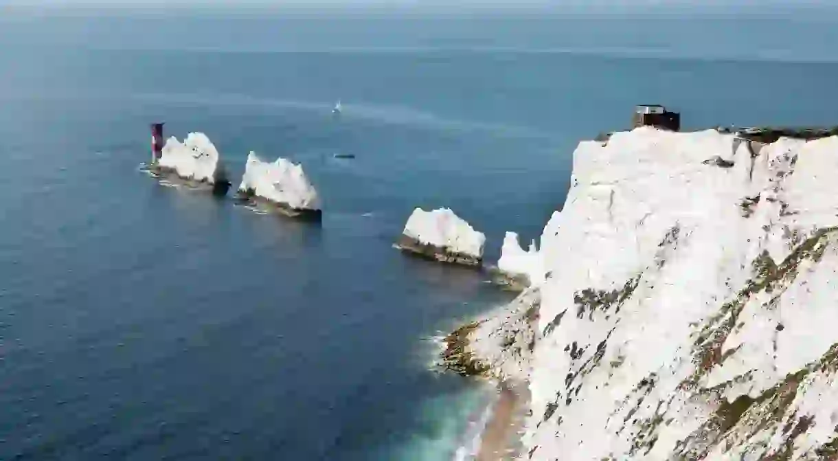 The Needles, with its red-and-white lighthouse, are one of the Isle of Wights most well-known sights