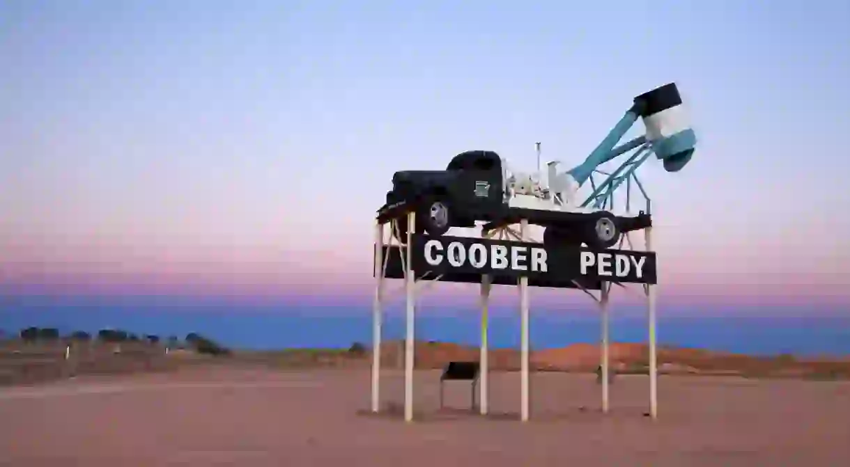 An old mining truck welcomes you to the town of Coober Pedy, which is known as the “opal mining capital of the world”