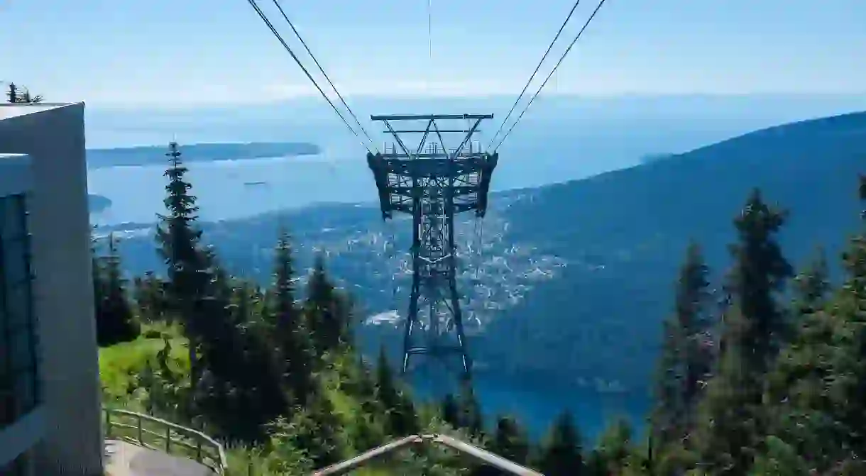 Enjoy the view of Coal Harbour by cable car from the top of Grouse Mountain