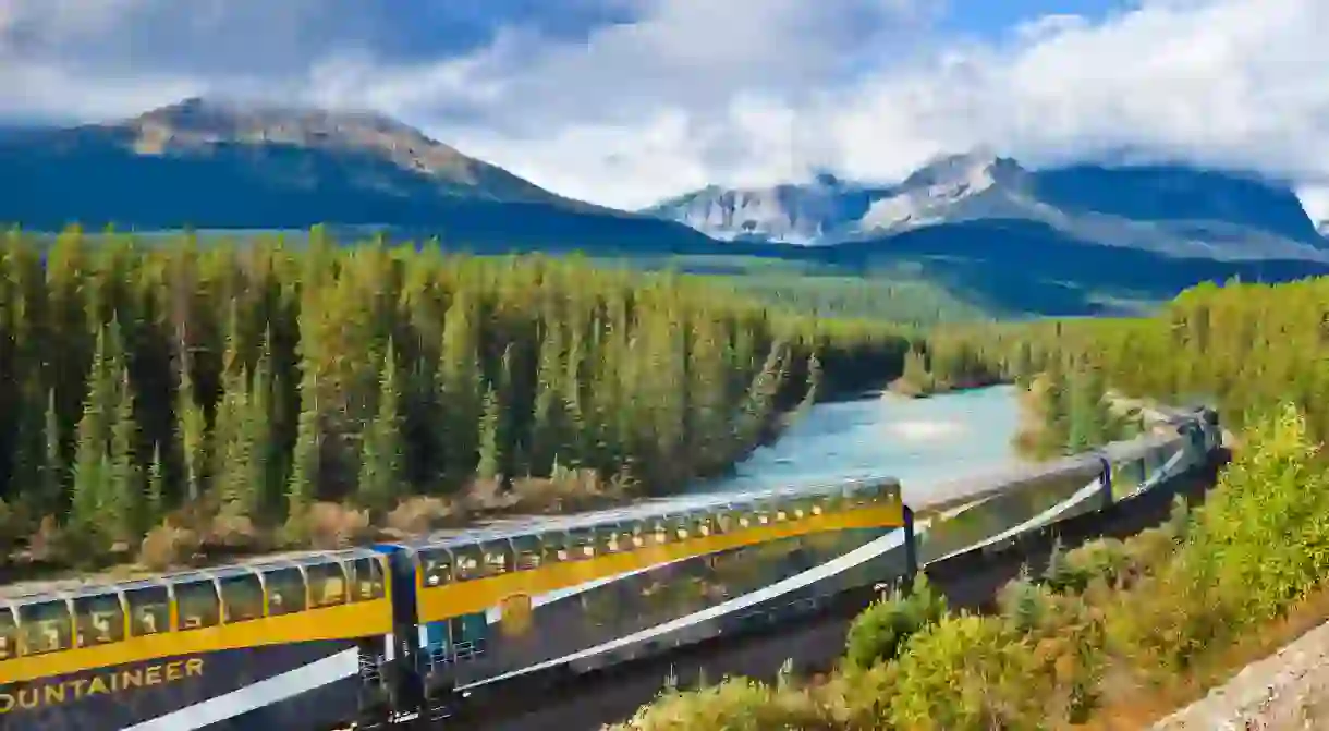 The Rocky Mountaineer offers an exhilarating train experience, taking you through the Rockies from Banff National Park to Vancouver