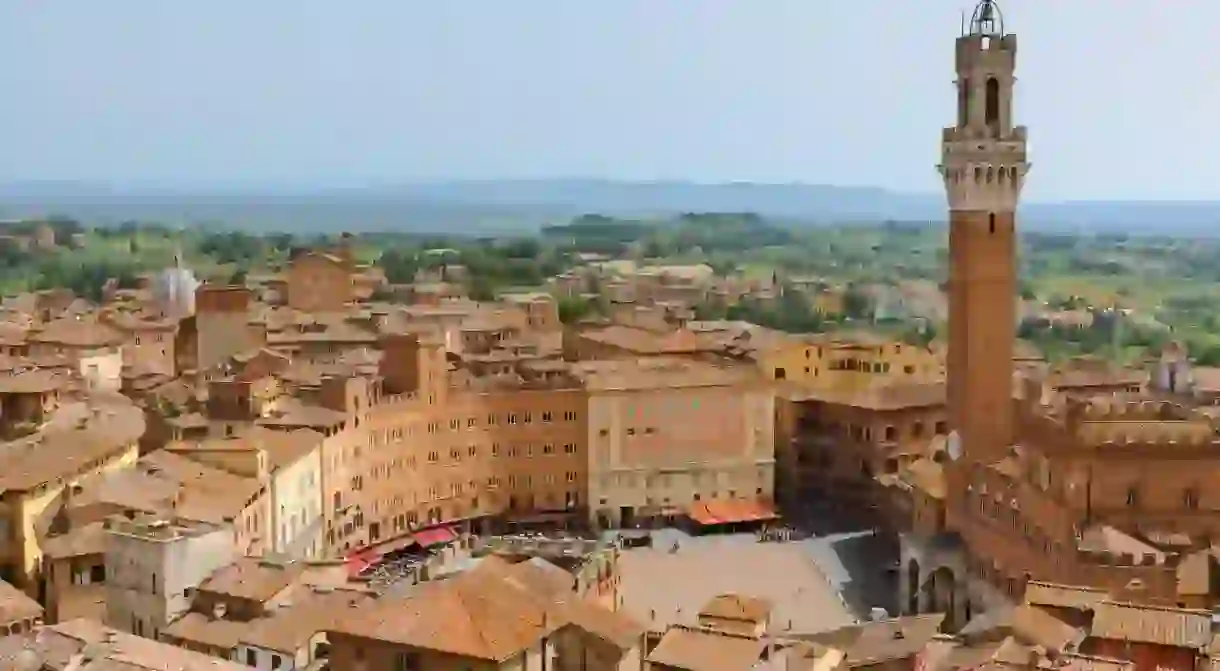 Siena is a charming Tuscan city that’s less crowded than Florence