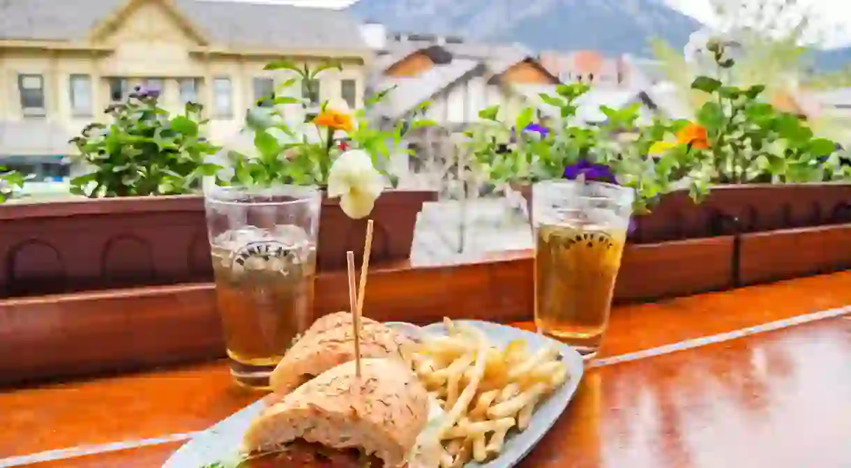 Enjoy beer and a bite with a view at the Banff Ave Brewing C, in the Rockies