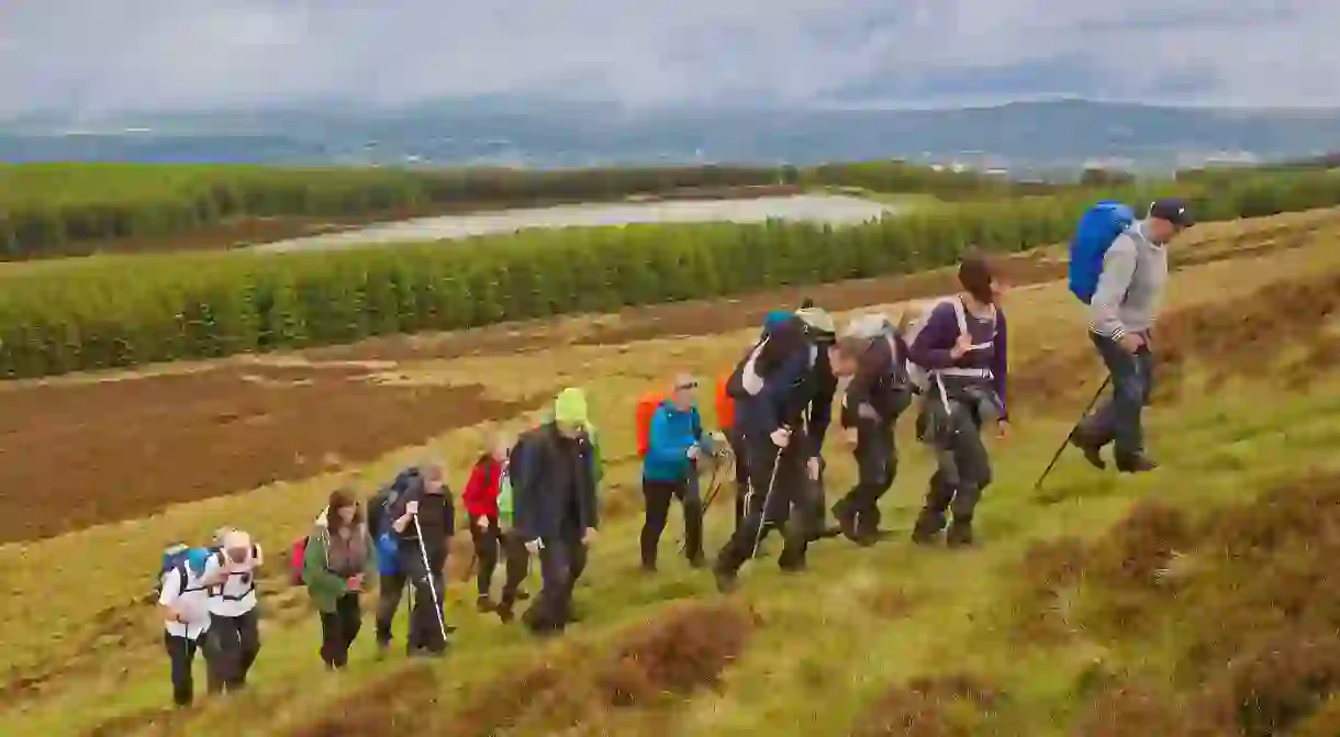 A rambling club enjoys a walk in the Pentland Hills near Bonaly Country Park