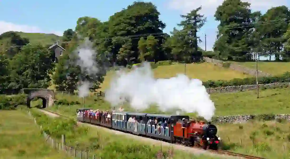 Take the Ravenglass and Eskdale Railway to enjoy breathtaking views of the Lake District’s countryside