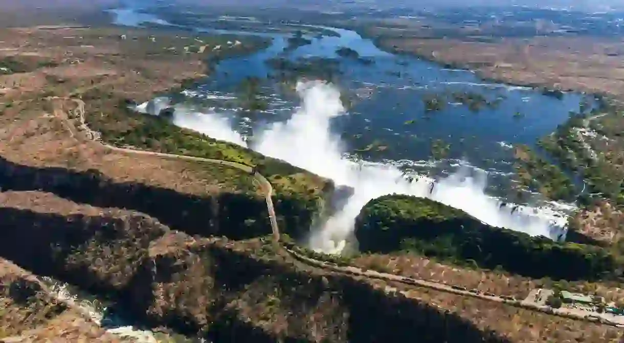 Aerial view by helicopter of Victoria Falls and Zambezi River