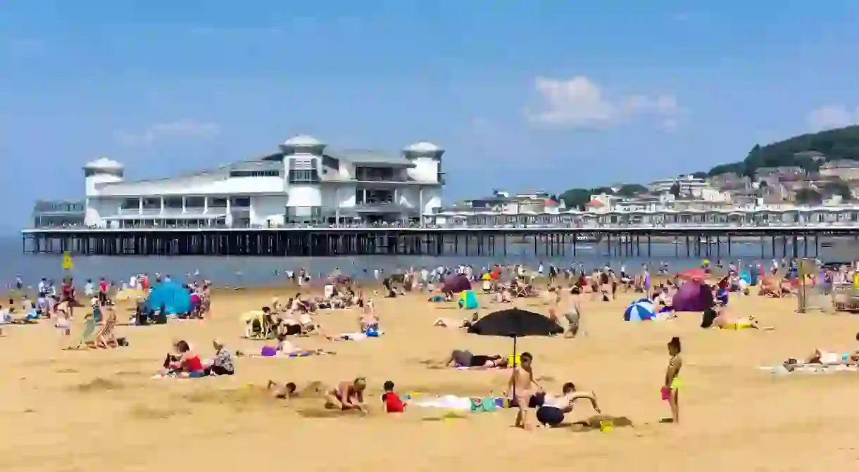 The Grand Pier and beach in Weston-super-Mare are essential stops at this British holiday destination