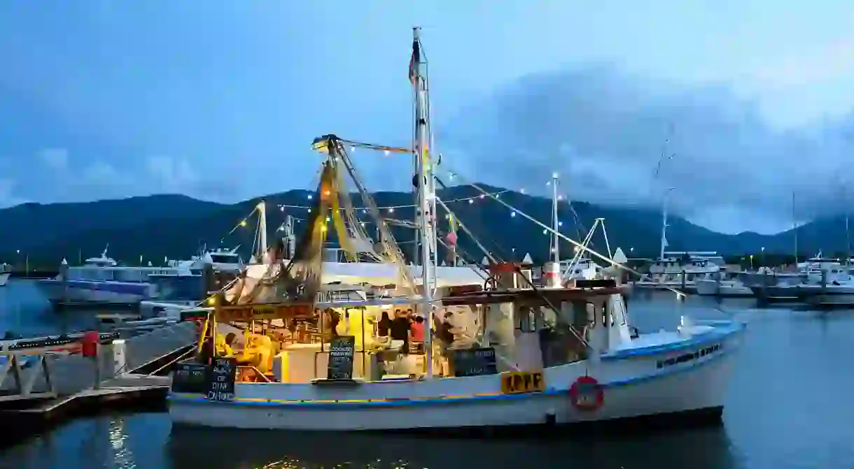 Dining options in Cairns include Prawn Star, a popular seafood restaurant on a boat