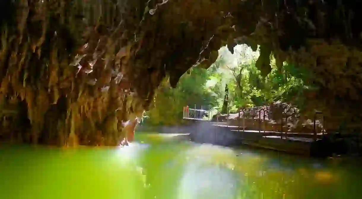 See the glow-worms on an underground cave cruise in Waitomo, New Zealand