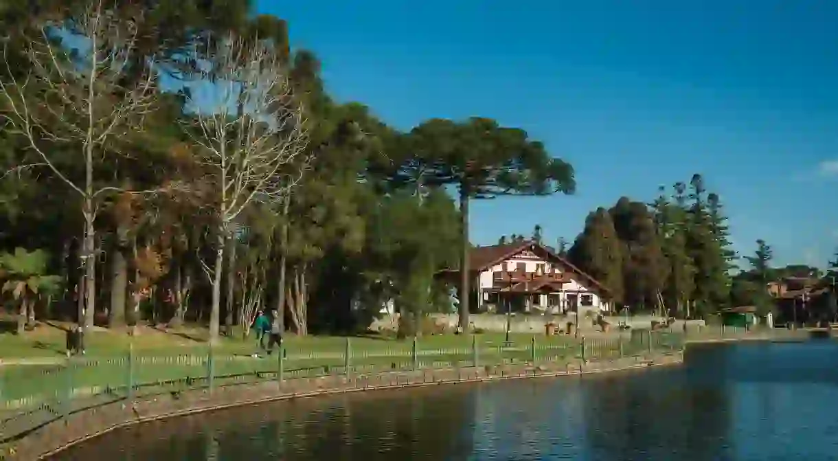 Joaquina Rita Bier Lake in Gramado, with a German-style house on its banks