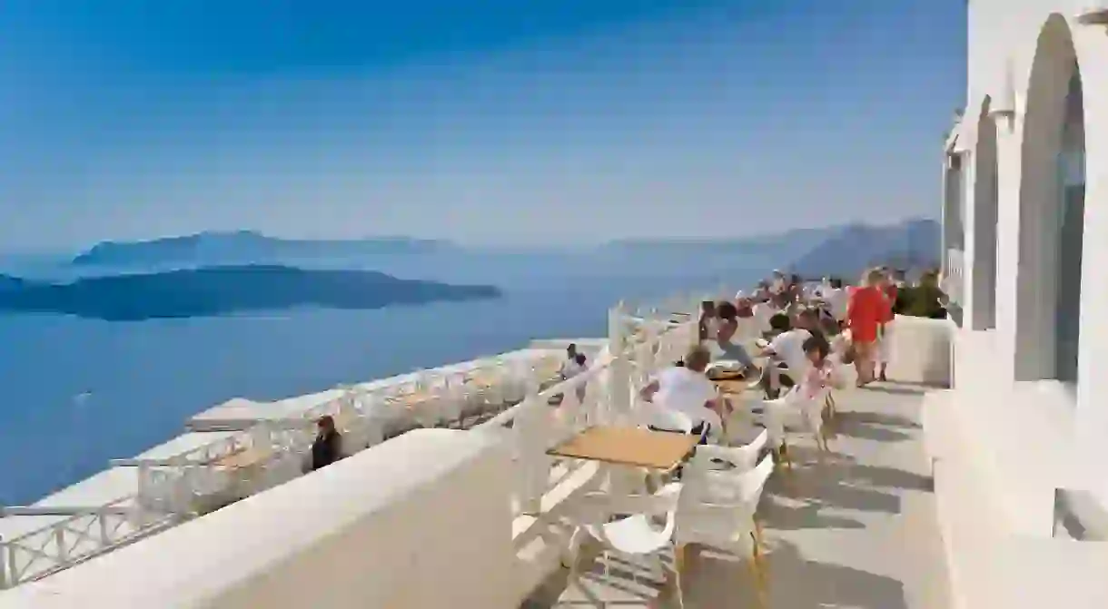 The Santo Winerys balcony is the perfect spot from which to take in magnificent views of Santorinis caldera