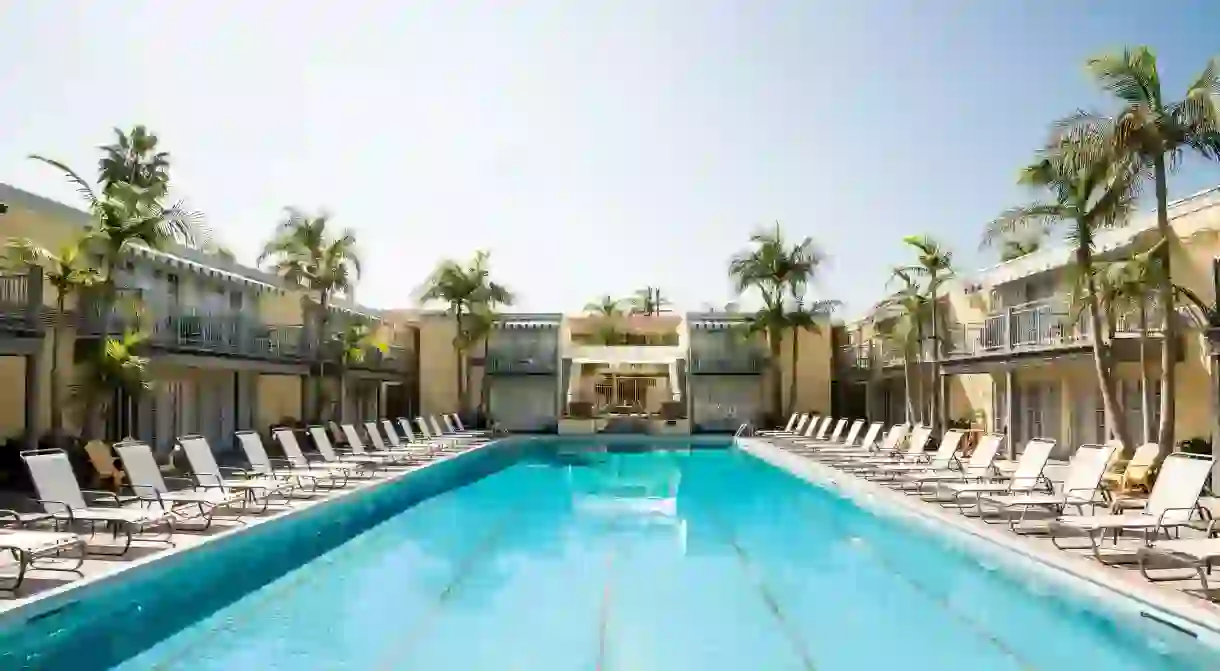 Get in some laps in the Olympic-sized pool at the Lafayette Hotel, Swim Club and Bungalows in San Diego