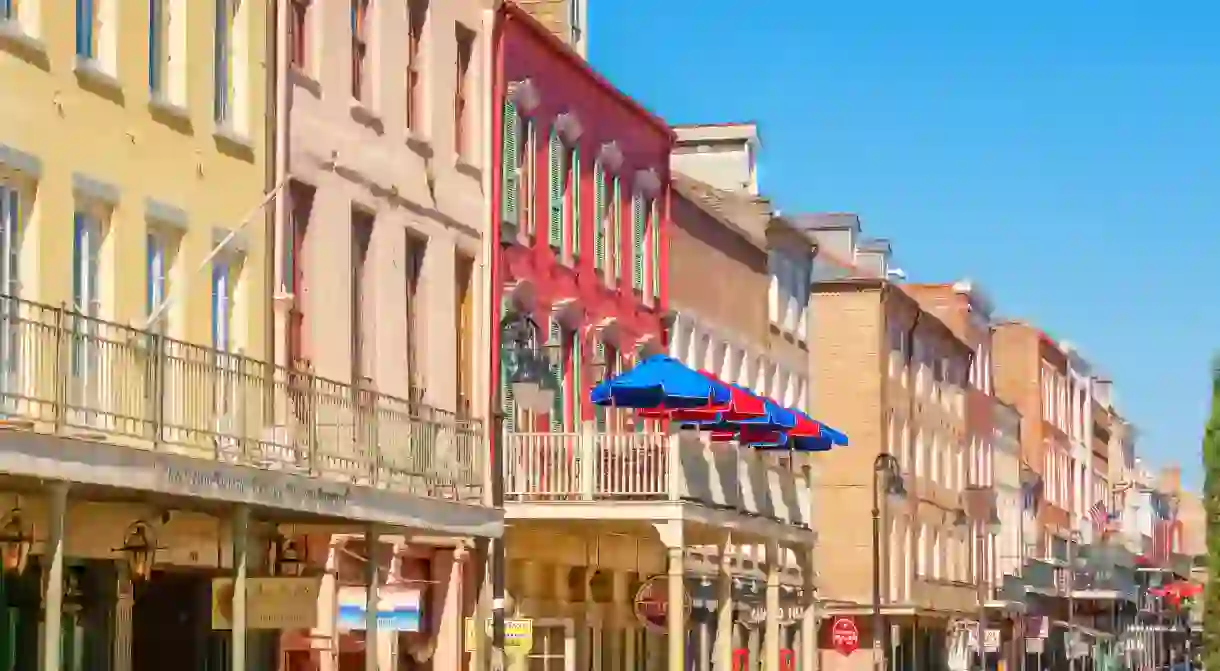 Colorful facades in the French Quarter of downtown New Orleans, Louisiana, USA on a sunny day.