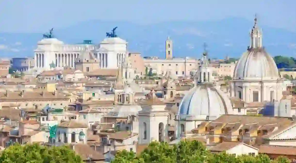 Take a tour of the most impressive buildings in Rome, including the imposing Victor Emmanuel II National Monument in the distance