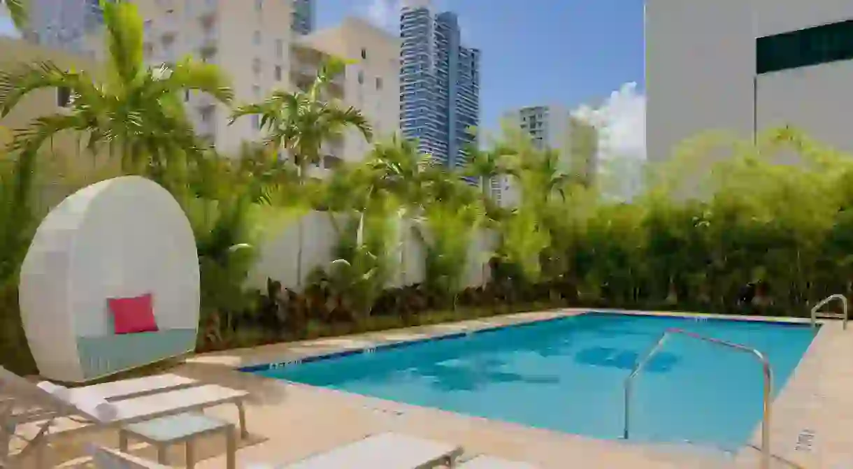 You can lounge by the pool under the Florida sun when you stay in the best budget hotels in Downtown Miami