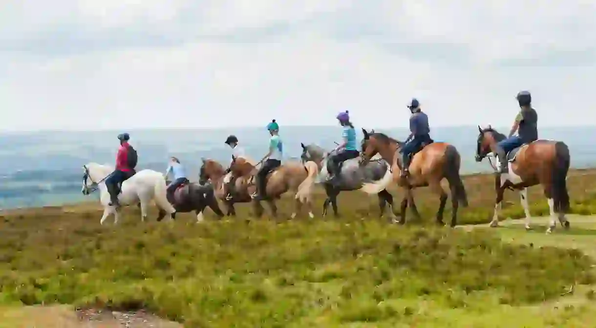 Horse riders at Dunkery Beacon in Exmoor National Park