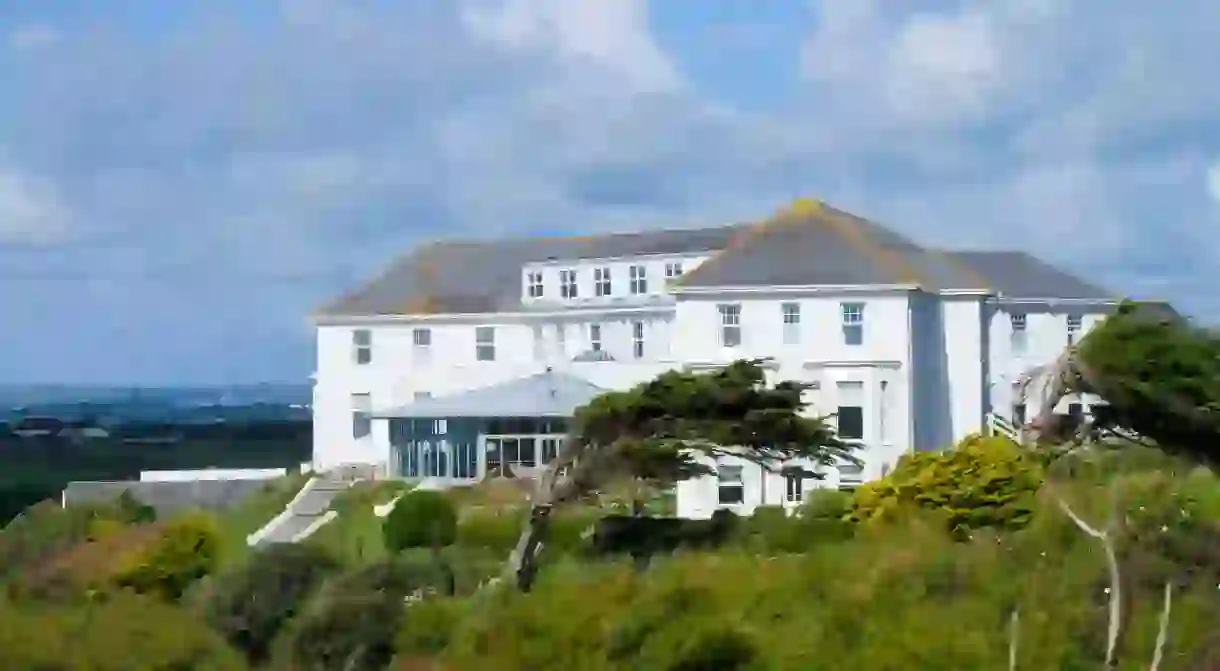 The cliff-edge Polurrian stands on Cornwalls rugged Lizard Peninsula