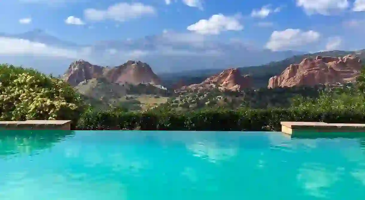 The infinity pool at the Garden of the Gods Resort and Club comes with unparalleled mountain views