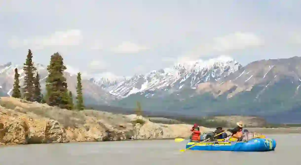 Take a raft down the Alsek River through the vast, untamed landscape of the Yukon