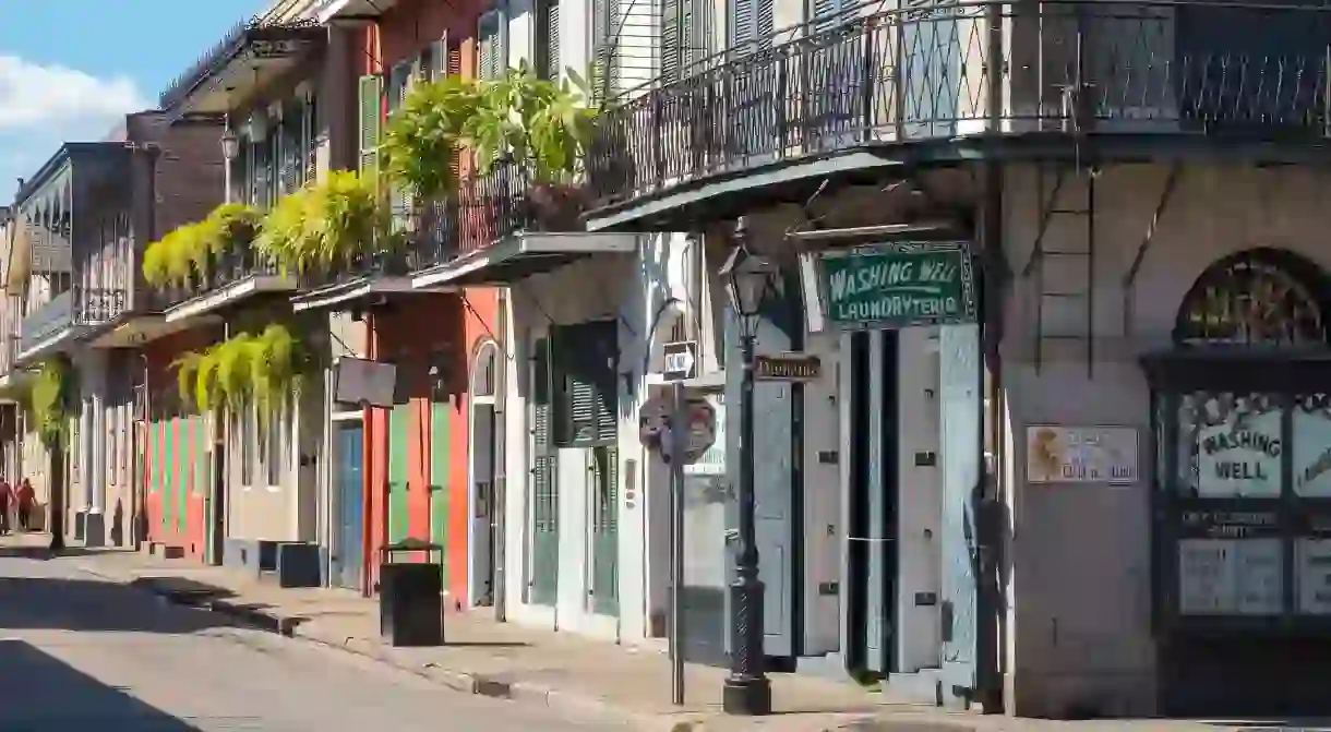 Old buildings line Bourbon Street in New Orleans French Quarter