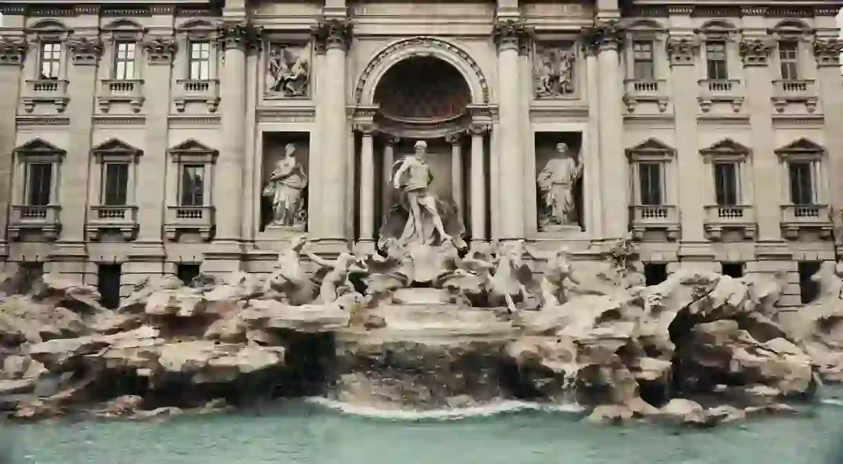 A boutique hotel is a perfect place to stay in Rome while you explore sights such as the Trevi Fountain