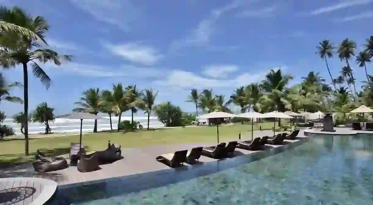 Watch the Indian Ocean waves from the comfort of a sun lounger at the Weligama Bay Marriott Resort and Spa