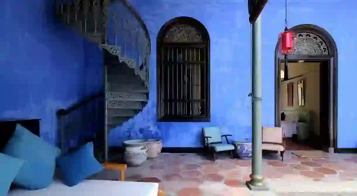 Penang has beautifully decorated hotels, such as the blue exterior at the Cheong Fatt Tze