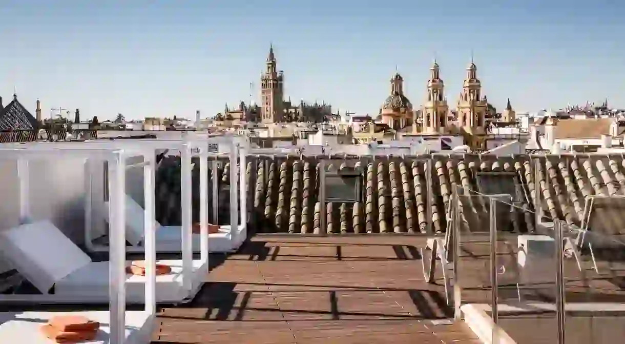 The best views of Sevilles royal Alcazar, cathedral and La Giralda bell tower are from these exquisite hotel rooftop pool-decks and spas