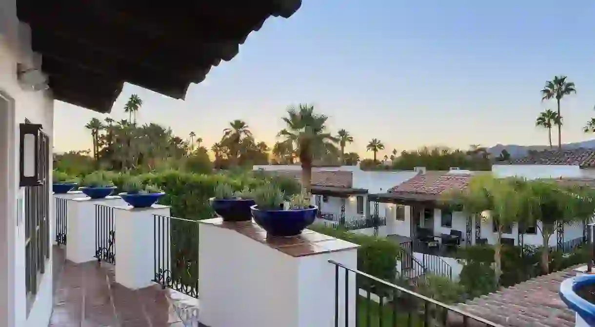 Enjoy a Palm Springs sunset from the comfort of your own balcony