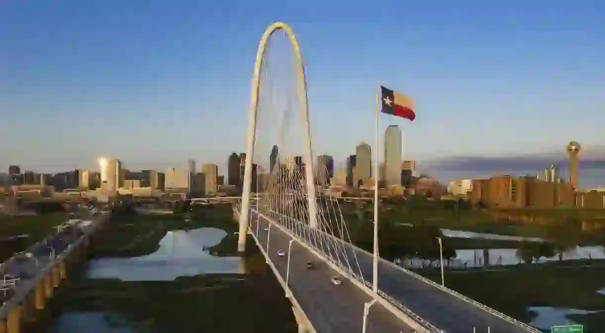 Explore the sights of Dallas, including the Margaret Hunt Hill Bridge, before checking into a cozy room