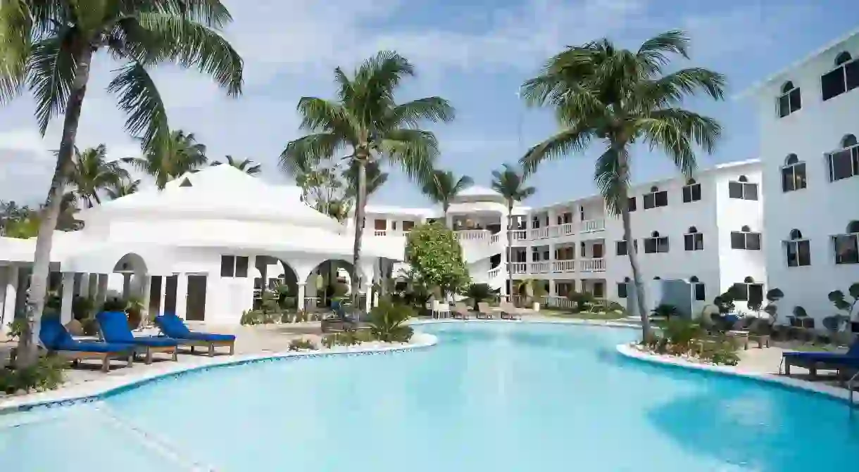 Relax poolside at the Ocean Palms Residences in Cabarete in the Dominican Republic