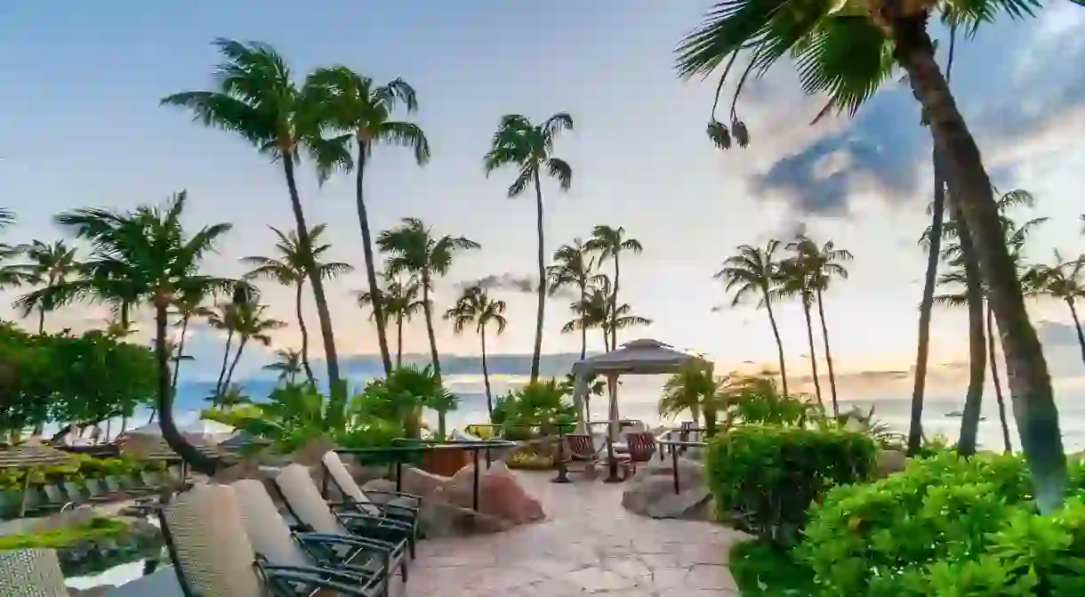 Kick back and soak up heavenly beachfront views of the sand and surf at one of Hawaiis best beach hotels