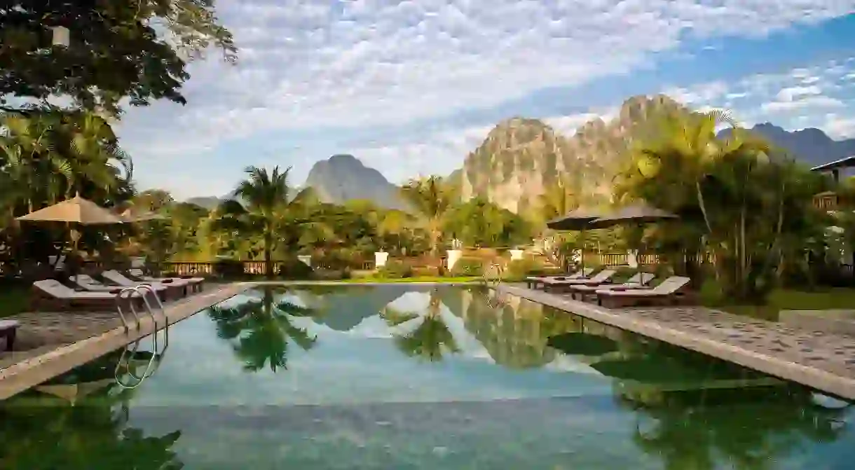 Enjoy the extraordinary landscapes of Laos at the Riverside Boutique Resort in Vang Vieng