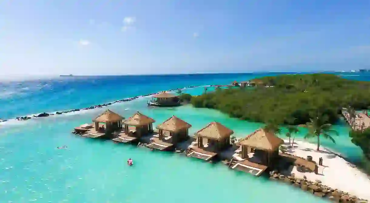 Try an outdoor treatment on this resorts private island, reached by free water taxi