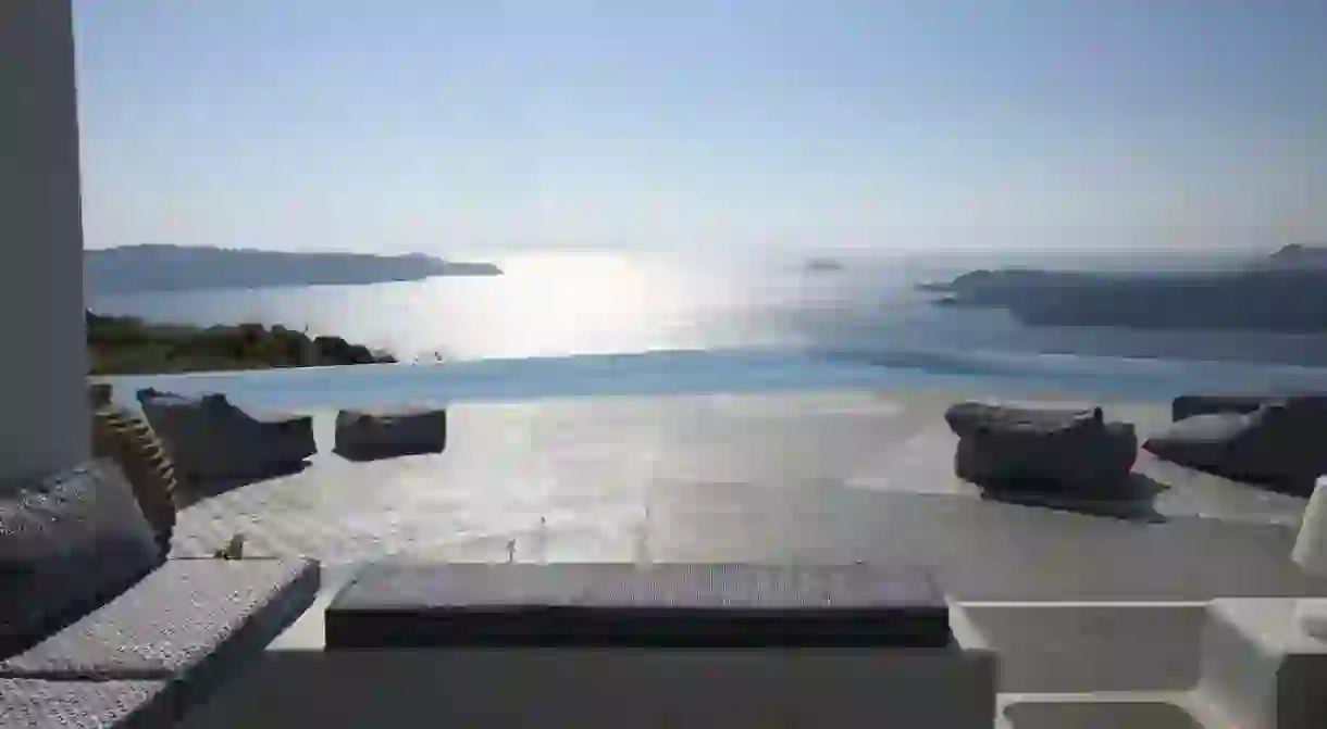 Enjoy incredible panoramas and an intimate, luxurious stay at Erosantorini on Santorini