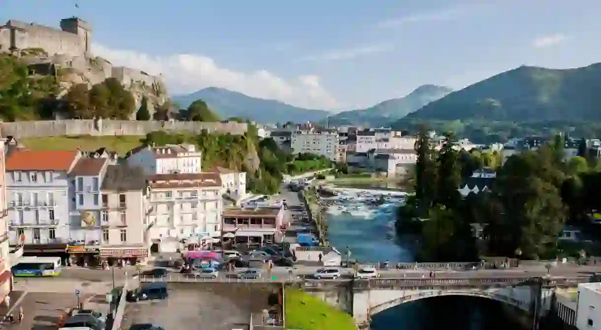 In the Pyrenean foothills, Lourdes is a major Catholic pilgrimage site