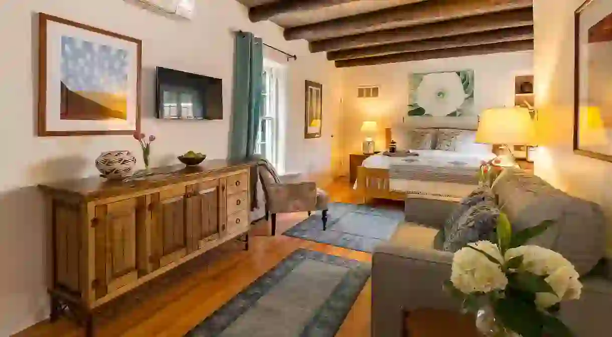 Discover a secluded slice of old Santa Fe within adobe walls