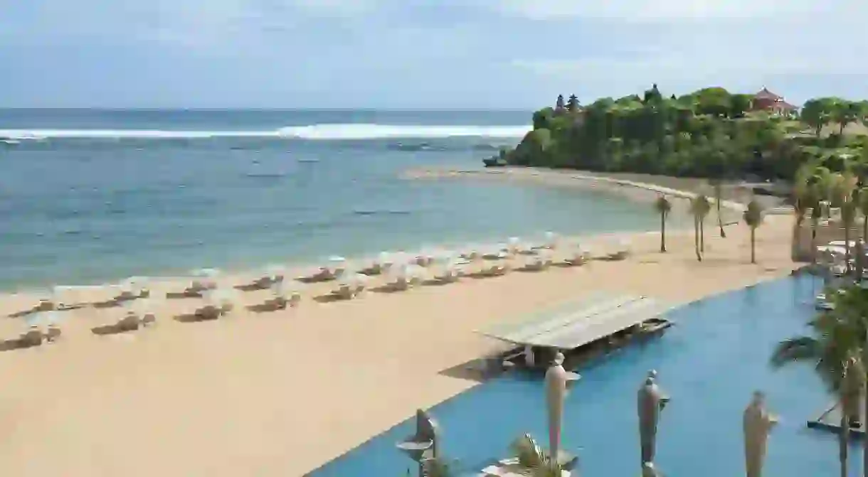 The spectacular beach of Nusa Dua is a prime destination for locals to enjoy the Indian Ocean