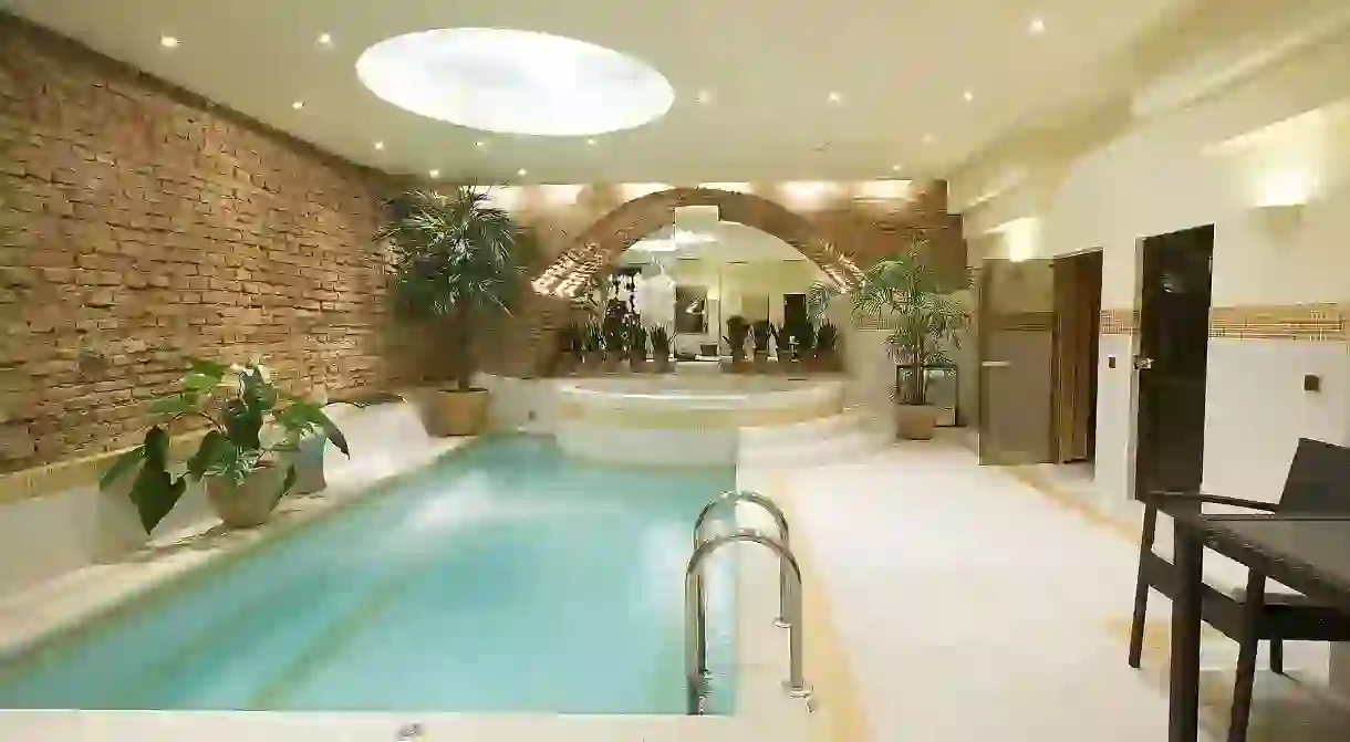 Relax in the soothing pool at the Narutis Hotel after sightseeing around Vilnius