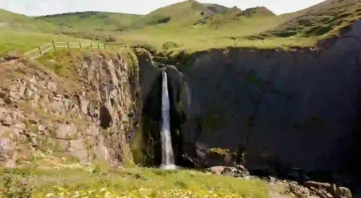 The South West Coast Path passes the dramatic Spekes Mill Mouth waterfall