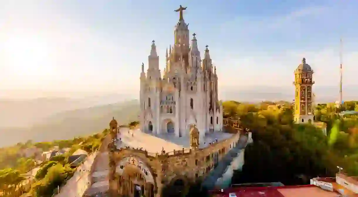 Aerial view of Barcelona skyline with Sagrat Cor temple, Catalonia