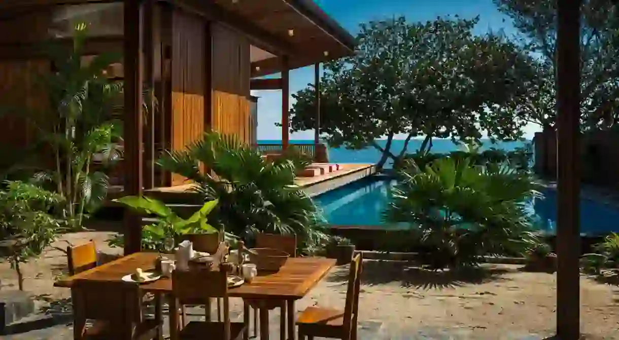 Find unique stays like Turtle Inn by Family Coppola Hideaways pressed between verdant jungle and turquoise Caribbean in Belize