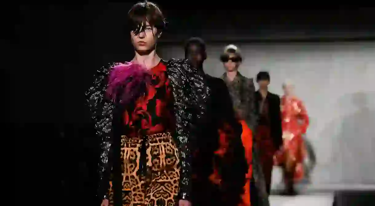 Dries Van Noten became famous for his expertise in mixing Eastern and Western styles; shown here is his Paris Fashion Week show from 2019